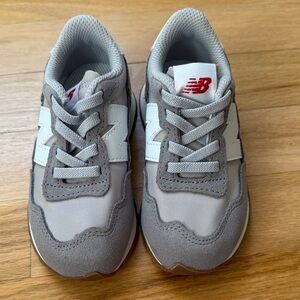 New Balance Kids Sneakers in Gray and White